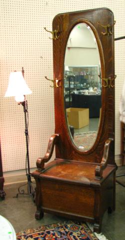 Appraisal: English oak hall tree with oval mirror and boot box