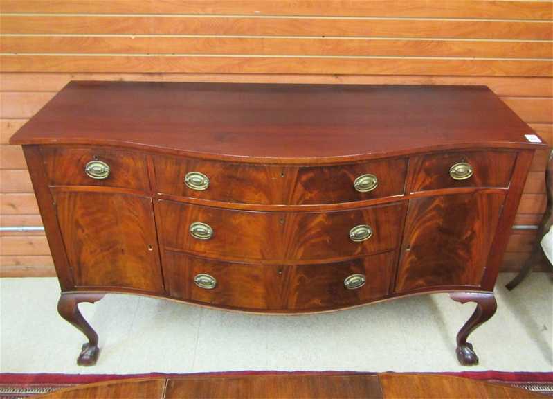 Appraisal: CHIPPENDALE REVIVAL MAHOGANY SIDEBOARD American c the serpentine front featuring