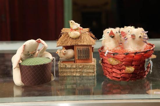 Appraisal: THREE EASTER DECORATIONS Cotton chicks in a nest h Fabric