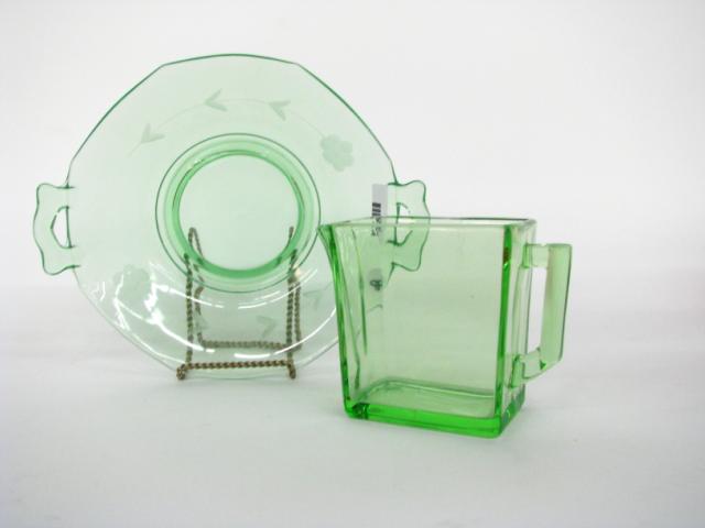 Appraisal: Two pieces of green Depression glass including handled plate and