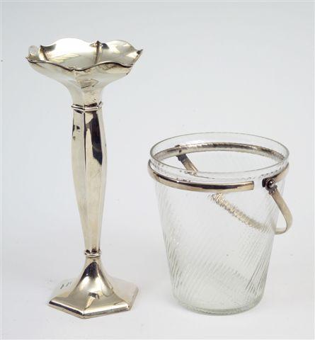 Appraisal: CONTINENTAL WHITE-METAL-MOUNTED GLASS ICE BUCKET possibly Swedish of swirling tapering