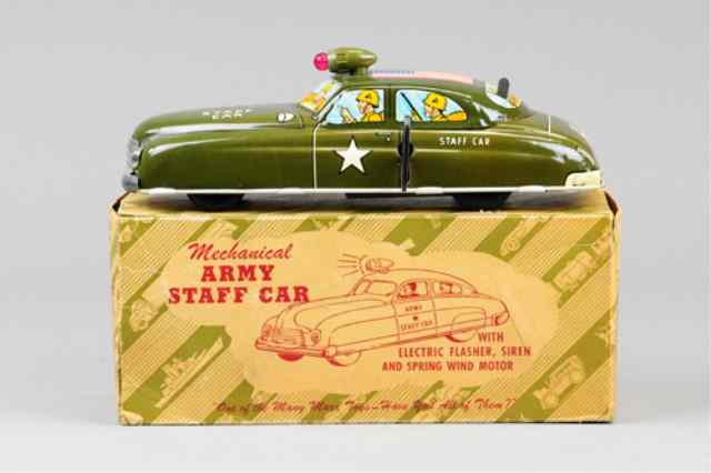 Appraisal: MARX BOXED ARMY STAFF CAR Lithographed tin great graphic images