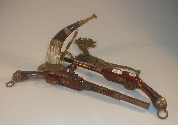 Appraisal: A pair of decorative Flintlock pistols and a horn trumpet