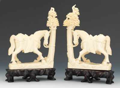 Appraisal: A Large Pair of Carved Ivory Horses th Century Carved