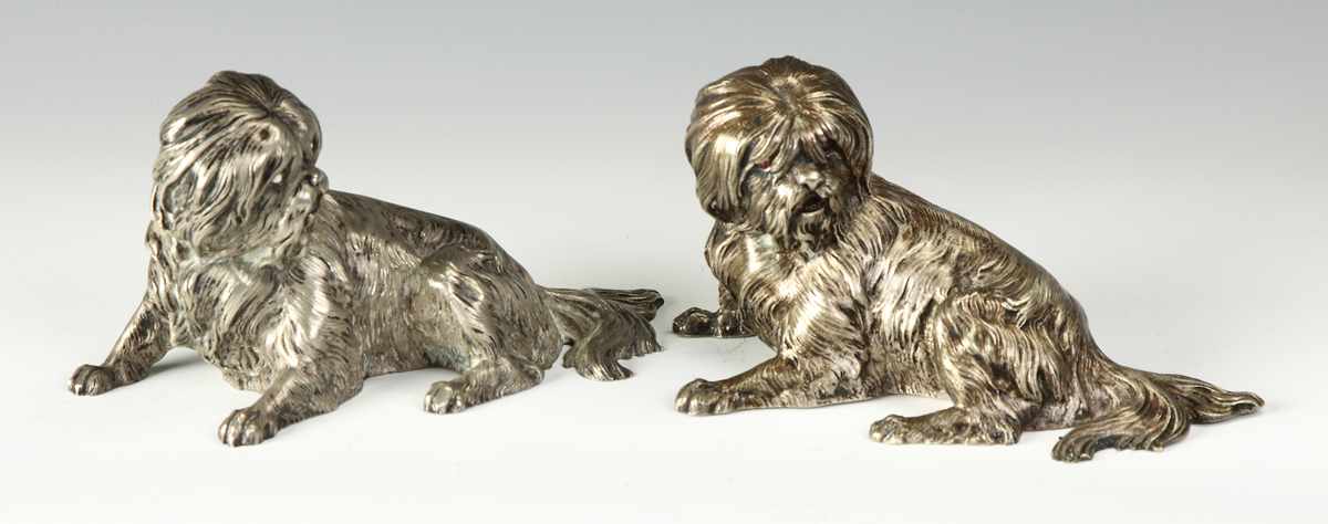 Appraisal: Pair of Silver Plated Shih Tzu Dogs C One inscribed