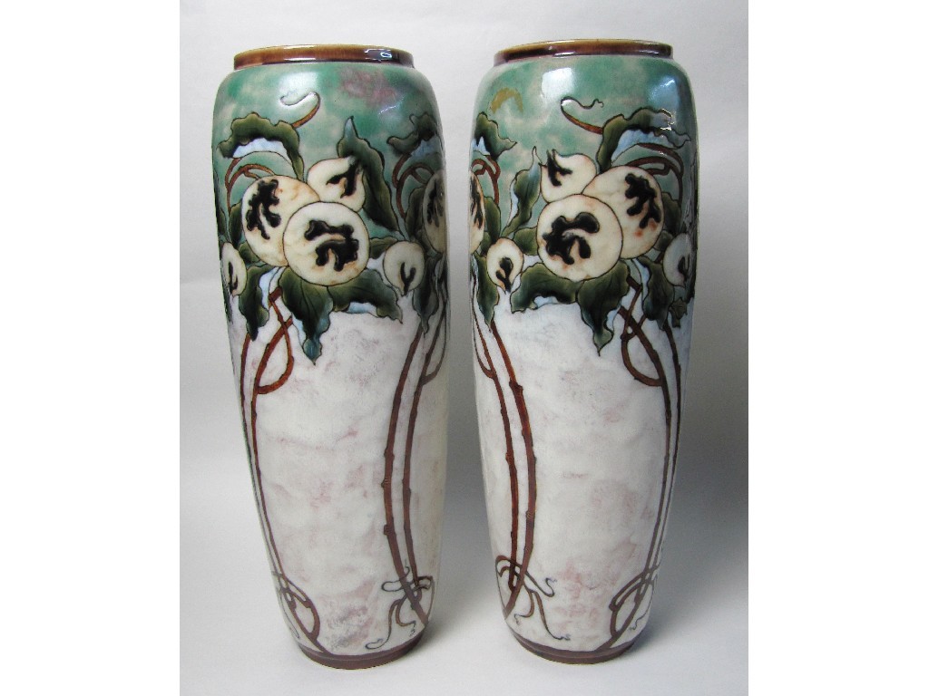 Appraisal: A pair of Royal Doulton stoneware tall cylindrical vases designed