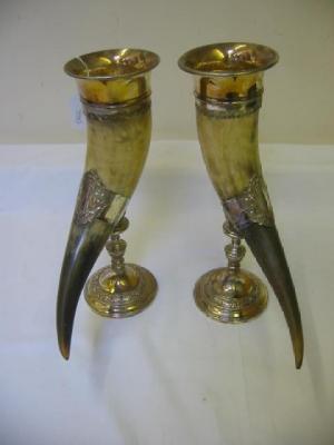 Appraisal: A PAIR OF W M F MOUNTED HORN VASES with