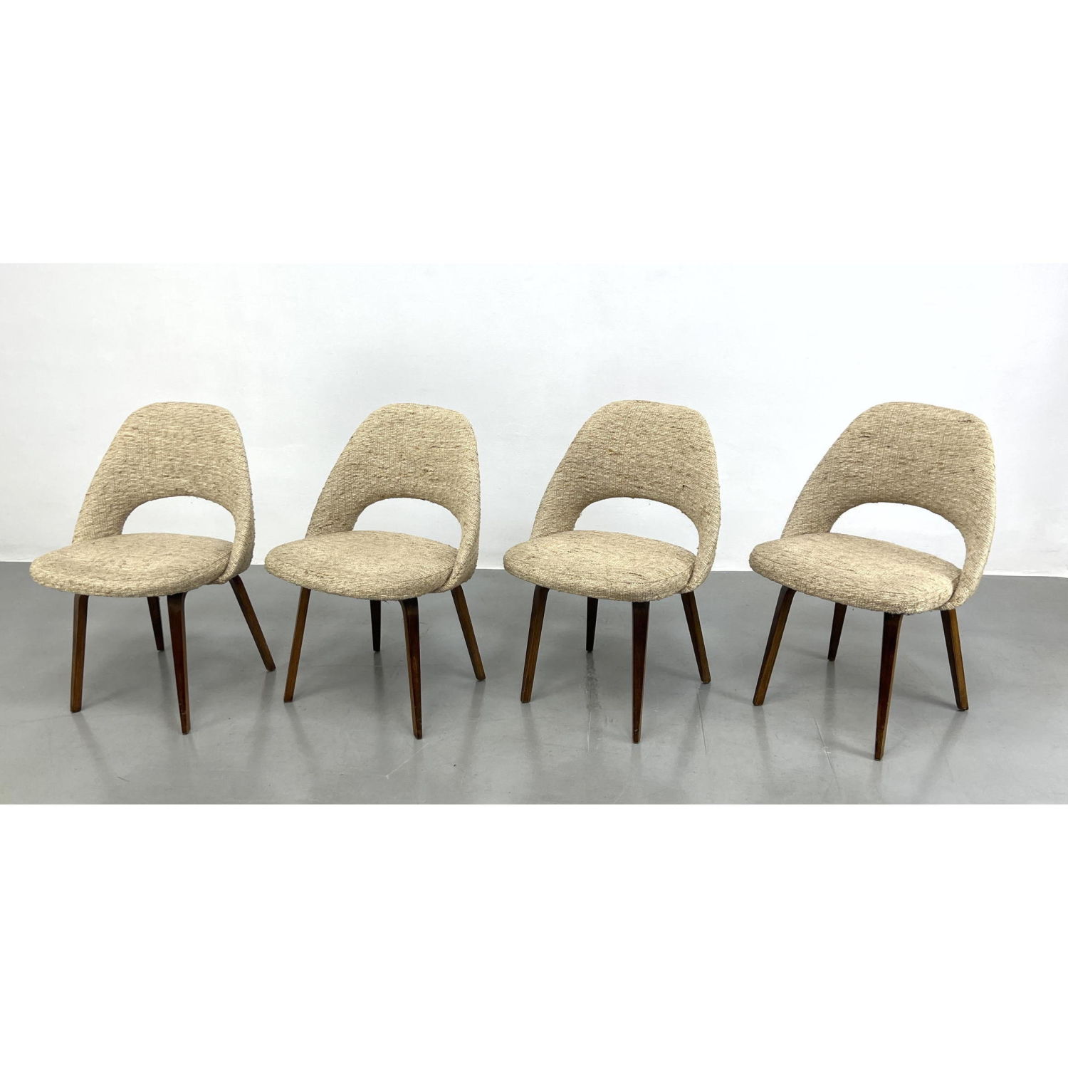 Appraisal: Set Eero Saarinen Dining Chairs Tweed Upholstery Frames with Laminated