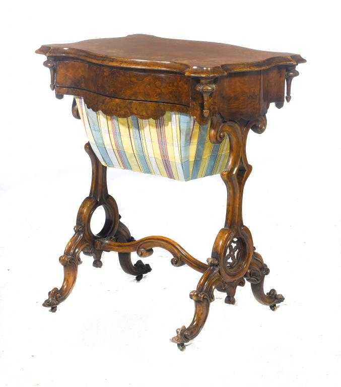 Appraisal: A VICTORIAN INLAID WALNUT SERPENTINE WORK TABLE the top decorated