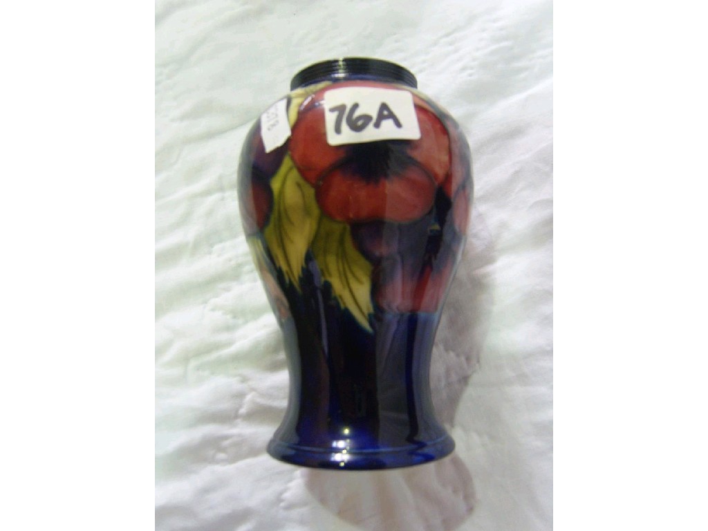 Appraisal: A Moorcroft vase of shouldered form with painted red and