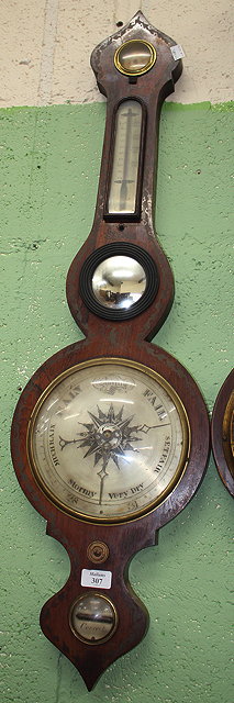 Appraisal: A VICTORIAN ROSEWOOD DIAL BAROMETER with onion top hydrometer thermometer