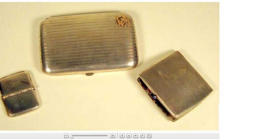 Appraisal: Three Victorian silver articlesComprising a cigarette case cheroot case and