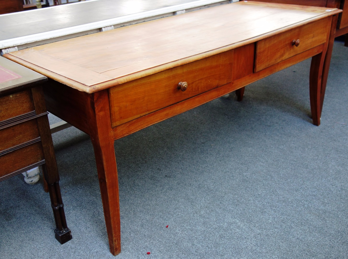 Appraisal: A th century French cherry rectangular farmhouse table with pair