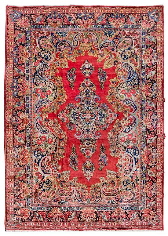 Appraisal: A Sarouk Wool Rug feet inches x feet inches A