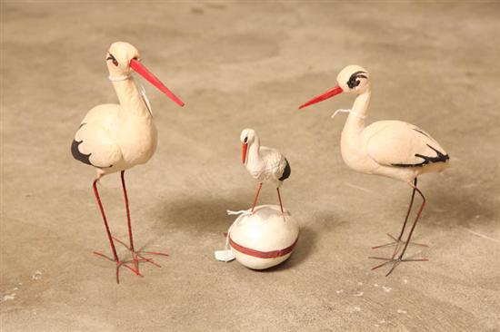 Appraisal: THREE STORKS One is a candy container with a composition