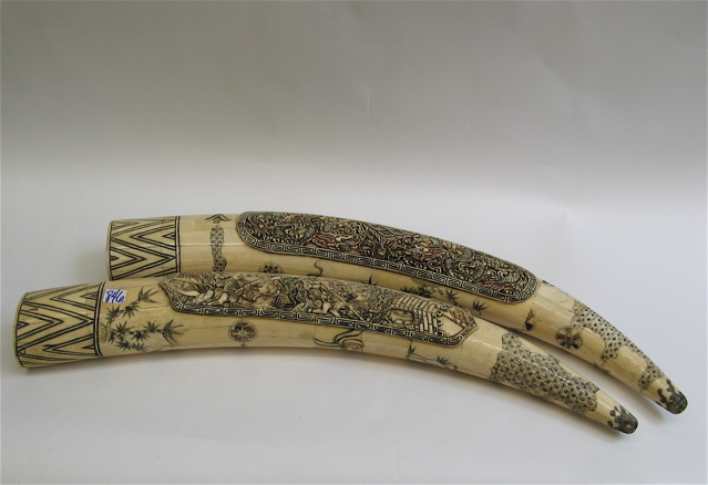 Appraisal: LARGE PAIR OF CHINESE CARVED BONE TUSKS with oblong cartouche