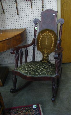 Appraisal: 's Ornate Mahogany Rocking Chair with rope twist spindles padded