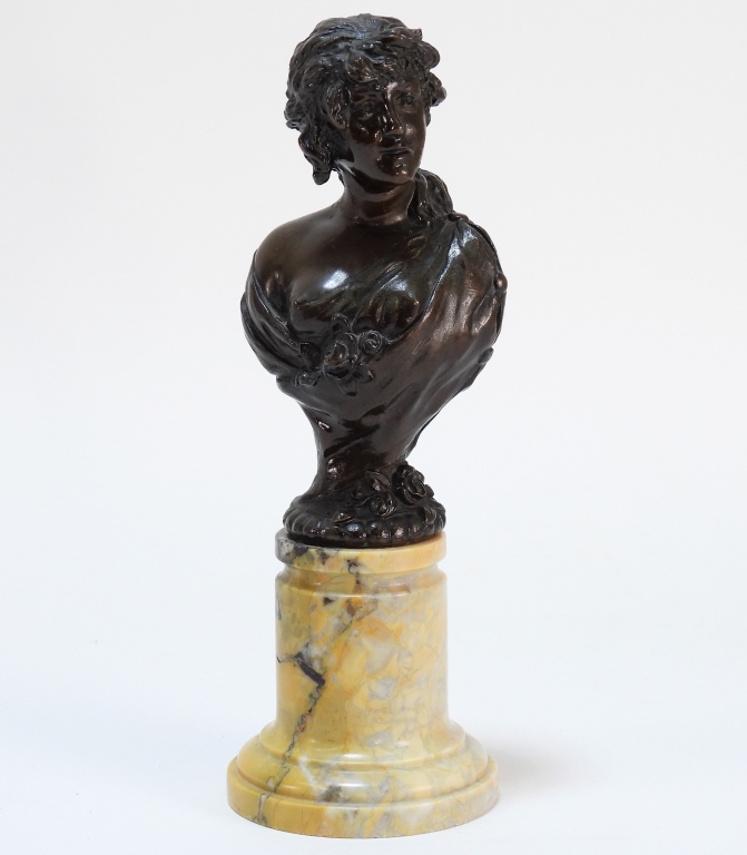 Appraisal: EUROPEAN GRAND TOUR BRONZE NUDE WOMAN BUST EuropeLate th CenturyDepicts