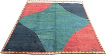 Appraisal: Gabbeh Carpet A large Gebbeh carpet featuring a bold geometric