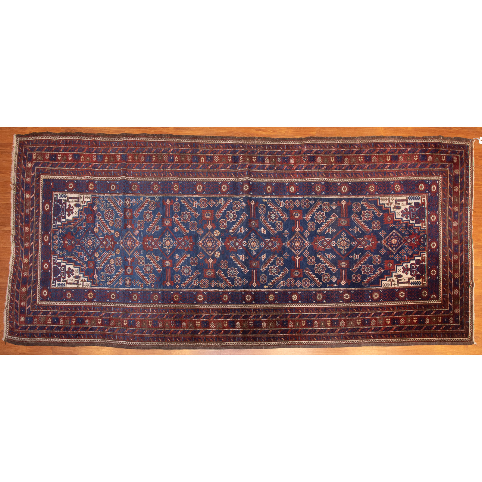 Appraisal: SEMI-ANTIQUE BALOUCH RUG PERSIA X Second-quarter- th century hand-knotted wool