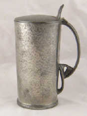 Appraisal: Tudric A Liberty Co Tudric lidded tankard of tapered hammered