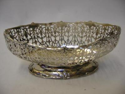 Appraisal: A SWEETMEAT DISH maker Dixons Sheffield of boat form with