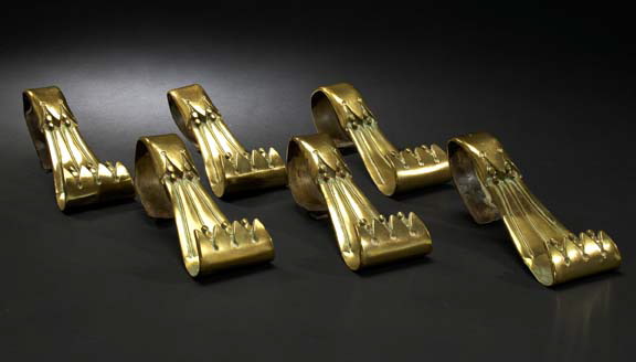 Appraisal: Anglo-American Polished and Lacquered Brass Tiebacks fourth quarter th century