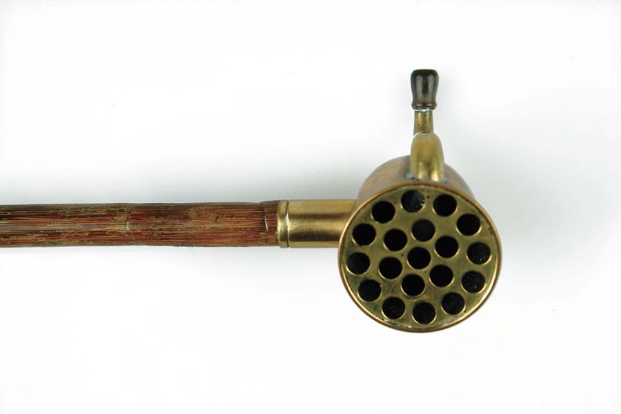 Appraisal: HEARING AID CANE Brass hearing aid mounts to a partridge