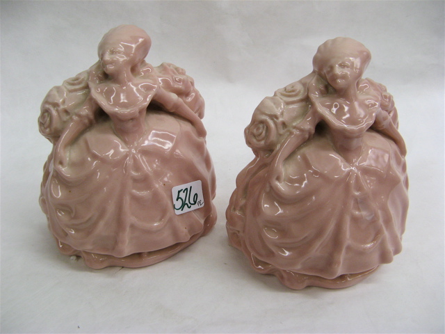 Appraisal: PAIR ROOKWOOD FIGURAL BOOKENDS American colonial ladies in long pink