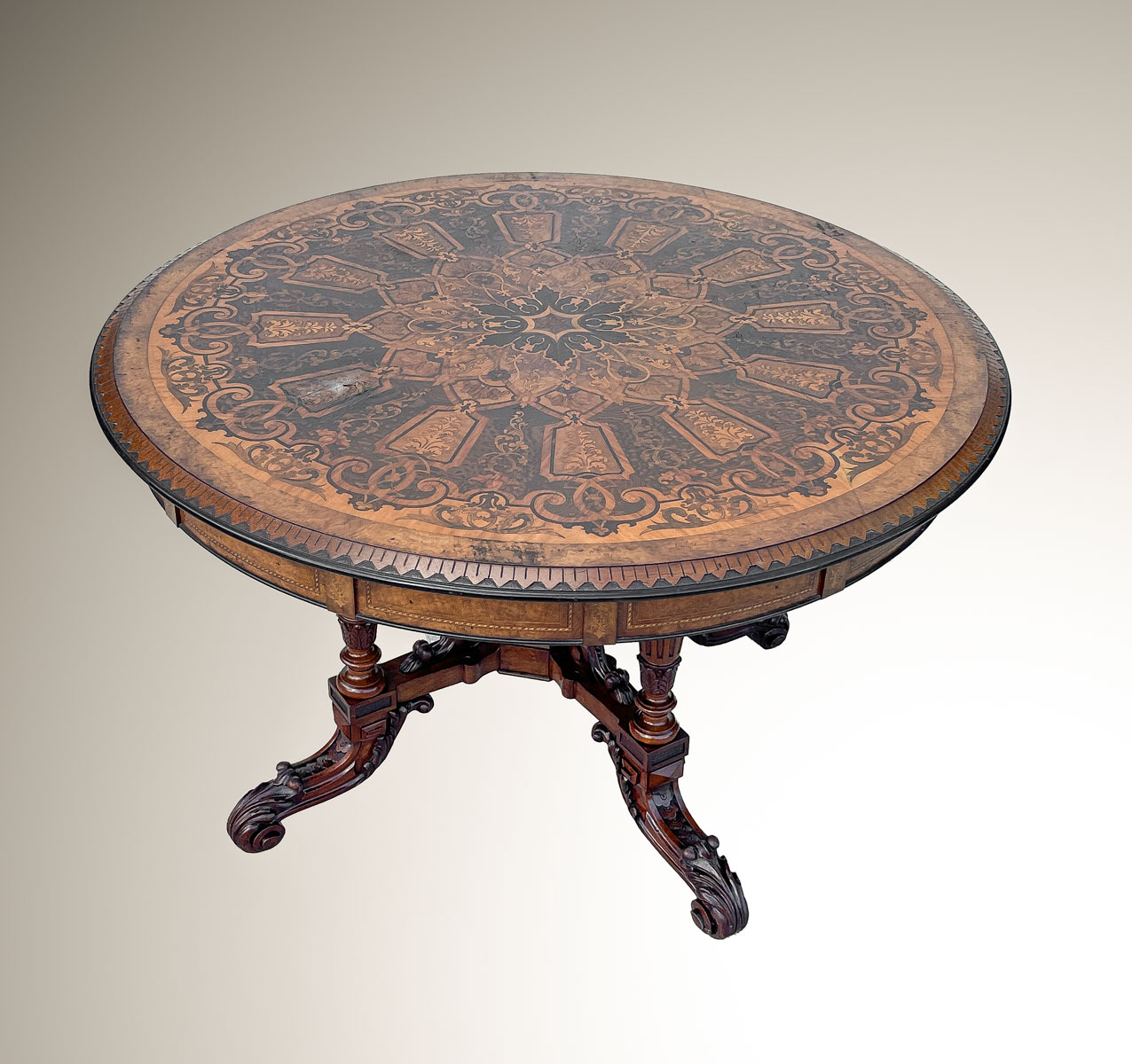 Appraisal: FINELY CARVED INLAID GERMAN PARLOR TABLE th century German parlor