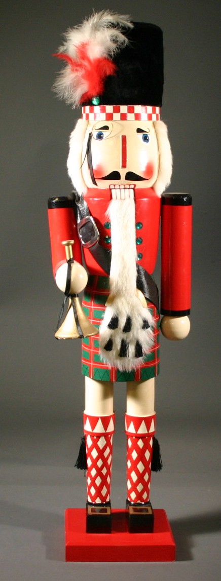 Appraisal: Modern wooden nutcracker Scotsman in kilt with horn