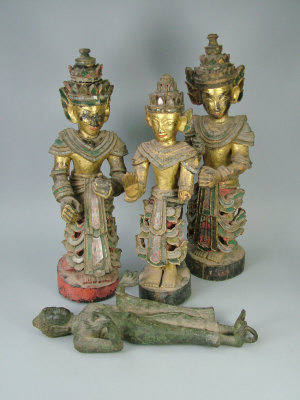 Appraisal: Three Indonesian carved and gilt highlighted wooden Temple Figures together