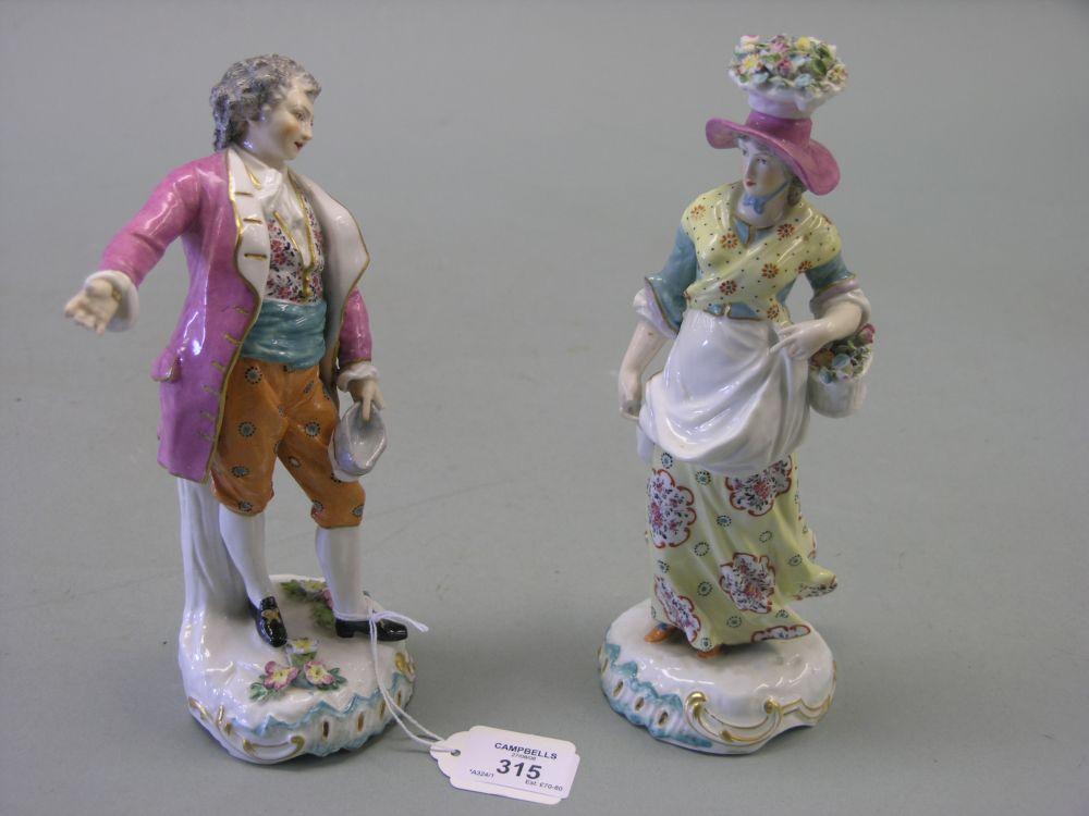 Appraisal: A pair of th century French porcelain figures in the