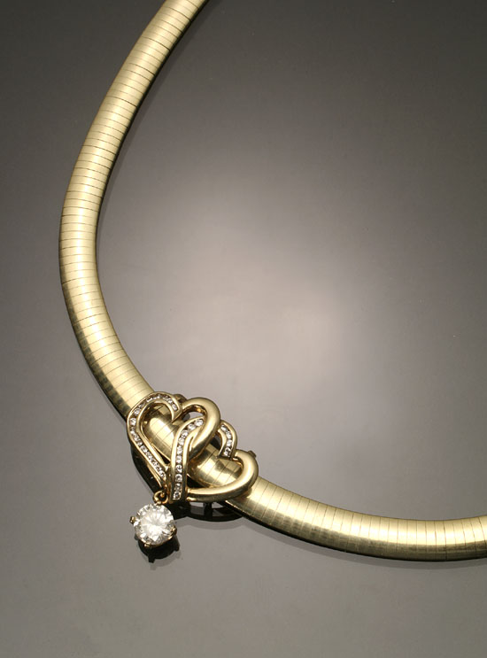 Appraisal: Italian Choker Length -Karat Yellow-Gold Omega Necklace and a Diamond