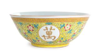 Appraisal: A Large Famille Jaune Porcelain Bowl A Large Famille Jaune