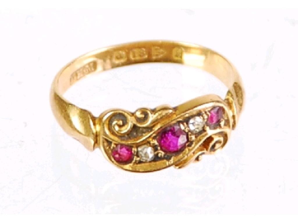 Appraisal: EDWARDIAN ct GOLD RING the scroll carved top set with