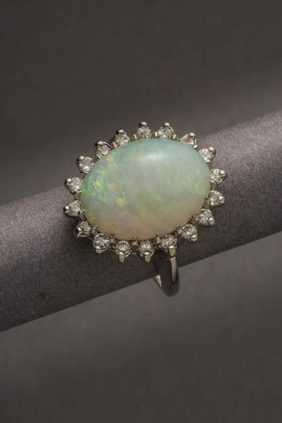 Appraisal: -Karat White-Gold Opal and Diamond Ring Centered with one oval