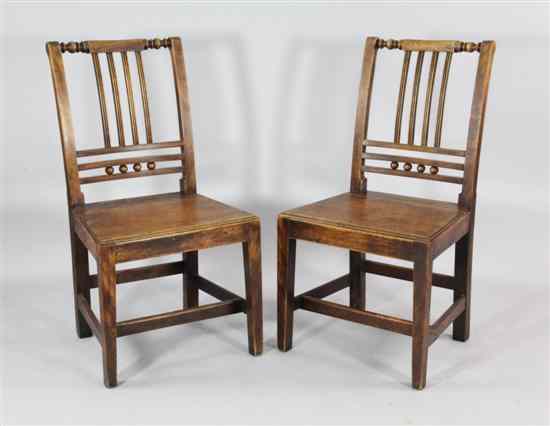 Appraisal: A set of four George III Irish fruitwood dining chairs