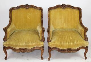 Appraisal: Pair French Regency walnut bergeres A pair of French Regency