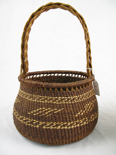 Appraisal: AN OREGON SILETZ INDIAN BASKET hand woven with cedar root