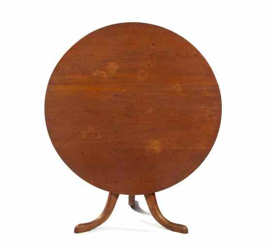 Appraisal: An American Various Woods Tilt-Top Occasional Table having a circular