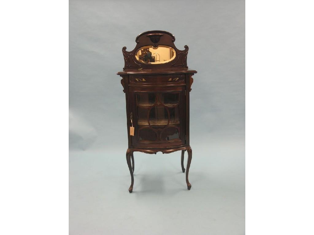 Appraisal: A late Victorian dark mahogany display cabinet raised scroll-shape back