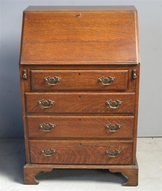 Appraisal: th Century oak fall front bureau the interior with pigeonholes