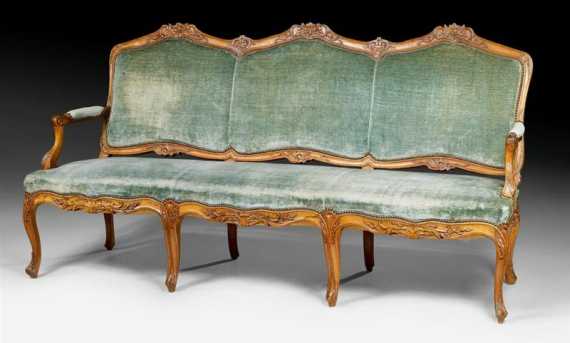 Appraisal: LARGE CANAPE Louis XV France circa Beech and walnut finely