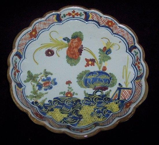 Appraisal: An th Century Italian maiolica circular teapot stand from the