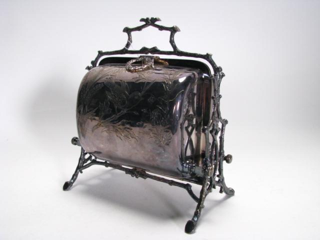 Appraisal: Antique silver plate bun warmer hand chased bird and botanical