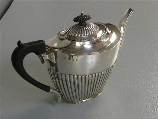 Appraisal: Edward VII silver tea pot of tapering oval form with