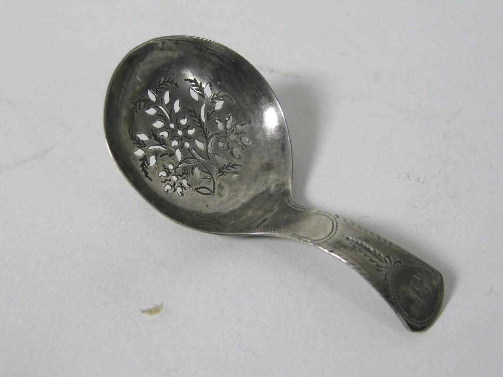 Appraisal: A George III Caddy Spoon with floral pierced and engraved