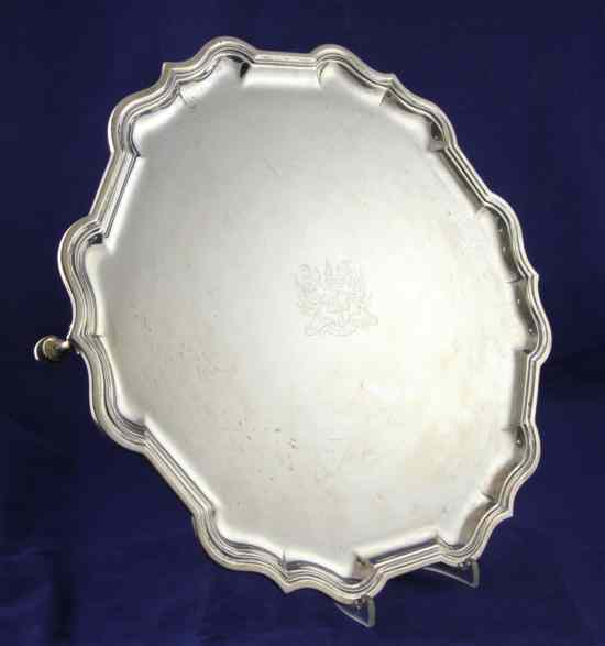 Appraisal: A 's silver presentation salver of shaped circular form with