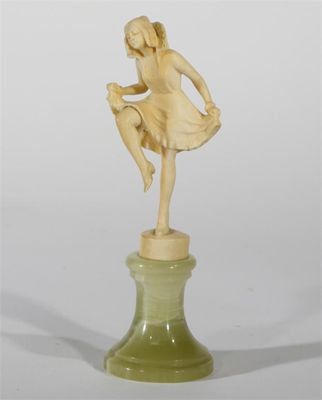 Appraisal: An ivory figure of a dancing girl in the manner